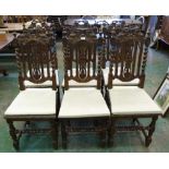 A set of six continental oak carved barleytwist chairs in 17th century style