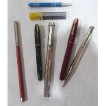 A Cartier pen (dents); a silver propelling pencil and other pens