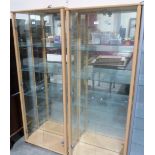 A pair of glazed display cabinets