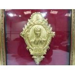 A framed ormolu relief plaque commemorating the death of Sir Robert Peel in 1850. The plaque 7¼'