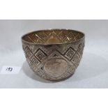 A Victorian silver bowl, with repousse decoration and reserved armorial London 1883. 5ozs 4½' diam