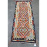 A Choli Kilim runner. 1.94m x 0.72m