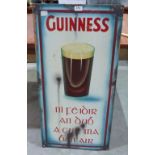 A metal Guinness themed sign. Of recent manufacture. 36' high