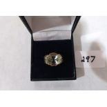 A 9ct green tourmaline ring. 7.7g gross. Size N½'
