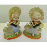 A pair of continental bisque nodding head vesta holders. 4¼' high