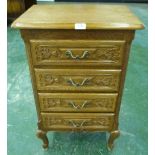 An oak chest of four drawers in the French Taste. 19½' wide