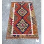 A Maiman Kilim rug. 1.26m x 0.79m