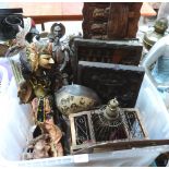 A box of ethnic treen carvings and metalware, the lot to include an eastern puppet