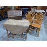 An oak barleytwist dropleaf table, a writing bureau and a set of four kitchen chairs