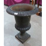A Victorian cast iron campana garden urn. 27½" high