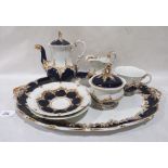 A continental seven piece tea service bearing crossed sword marks in underglaze blue