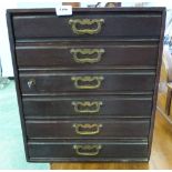 A small oak chest of six drawers. 18' high