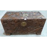 A Chinese carved camphorwood blanket chest. 37' wide