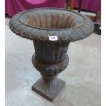 An early 20th century cast iron campana garden urn. 27½' high