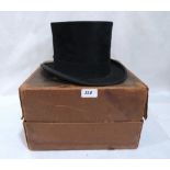 A top hat by Gieves Ltd. Inside headband measurement 7¾'