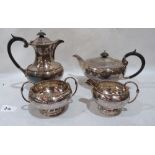 A George V silver tea service comprising a teapot; a water jug; a milk jug and a sucrier.