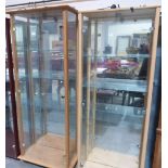 Three glazed display cabinets