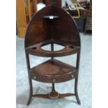 A George III mahogany corner washstand