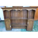 An oak dresser rack. 54½' wide