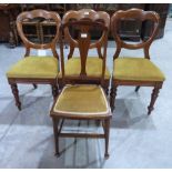 A set of three Victorian walnut balloon-back dining chairs and a 1920s bedroom chair