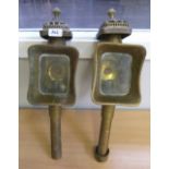 A pair of brass coaching lamps, marked Limehouse Lamp Co, London, but of recent manufacture. 19½'