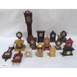 A collection of 16 miniature clock models by the Franklin Mint