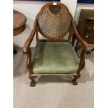 A CANE BACK ARMCHAIR, BEDSIDE CABINET AND TWO FOOTSTOOLS