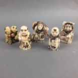 A LOT OF FIVE CARVED BONE FIGURAL NETSUKES