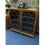 A 20TH CENTURY TWO DOOR DISPLAY CABINET