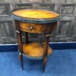 A WALNUT OVAL TWO TIER OCCASIONAL TABLE