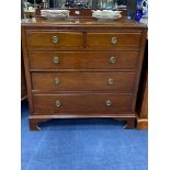 A 20TH CENTURY MAHOGANY CHEST OF FIVE DRAWERS