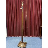 A MAHOGANY STANDARD LAMP