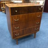 A STAINED WOOD CHEST OF FOUR DRAWERS