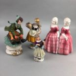 A NORITAKE FIGURE OF A CHILD AND THREE OTHER FIGURES