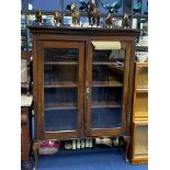 A 20TH CENTURY MAHOGANY BOOKCASE