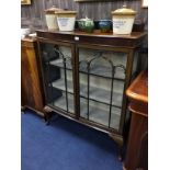 A MAHOGANY DISPLAY CABINET