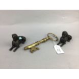 A LARGE BRASS KEY, BRASS BELT BUCKLES AND OTHER ITEMS