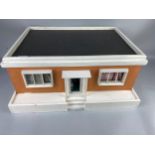 A VINTAGE CHILD'S DOLLS HOUSE