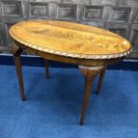 AN OAK OVAL OCCASIONAL TABLE