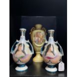 A PAIR OF TWIN HANDLED GERMAN VASES AND ANOTHER VASE