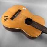 A CHILD'S ACOUSTIC GUITAR