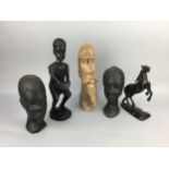 A LOT OF FOUR AFRICAN WOOD CARVINGS ALONG WITH ANOTHER