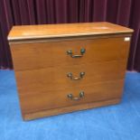 A STAINED WOOD CHEST OF DRAWERS