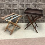 AN OAK BUTLERS STAND, A MAHOGANY TRAY AND A LUGGAGE STAND