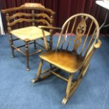 AN ERCOL ROCKING CHAIR AND AN EDWARDIAN CORNER CHAIR