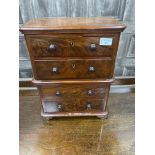 A 20TH CENTURY MINIATURE MAHOGANY CHEST ON CHEST