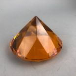 A ROSENTHAL AMBER GLASS MODEL DIAMOND AND THREE PAPERWEIGHTS