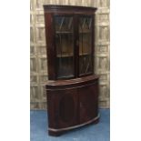 A MAHOGANY REPRODUCTION CORNER CUPBOARD