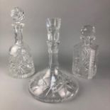 A LOT OF THREE CRYSTAL DECANTERS WITH STOPPERS