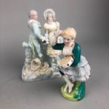 A HAND PAINTED FIGURE OF A SEATED FEMALE AND OTHER CERAMICS